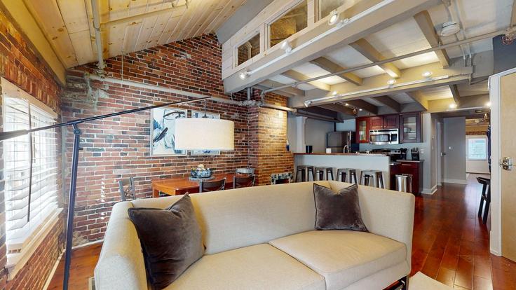 Elegante sala de estar con mobiliario moderno en un apartamento en Building Union Street - stars-of-boston - 1436053 en Boston, Boston