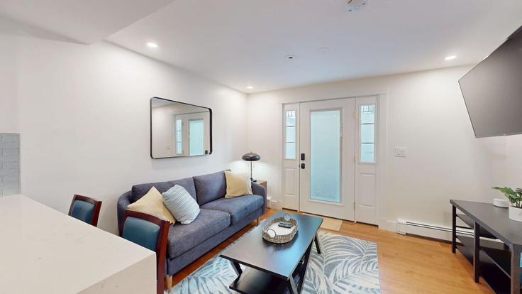 Elegante sala de estar con mobiliario moderno en un apartamento en Building Montgomery Street - stars-of-boston - 1238167 - BOS en Cambridge, Cambridge