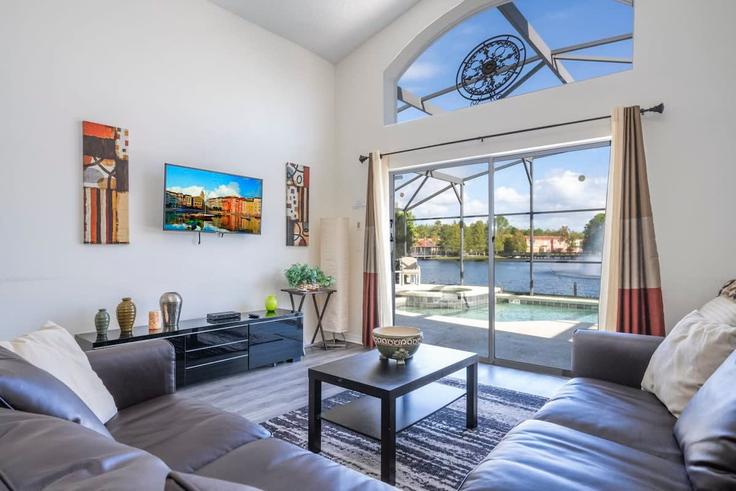 Building Madiera Beach Boulevard - stars-vacation-homes-dba - 1603856 adresindeki bir dairede modern mobilyalarla zarif bir şekilde tasarlanmış oturma odası Kissimmee, Kissimmee Building Madiera Beach Boulevard - stars-vacation-homes-dba - 1603856 adresindeki bir dairede modern mobilyalarla zarif bir şekilde tasarlanmış oturma odası Kissimmee, Kissimmee