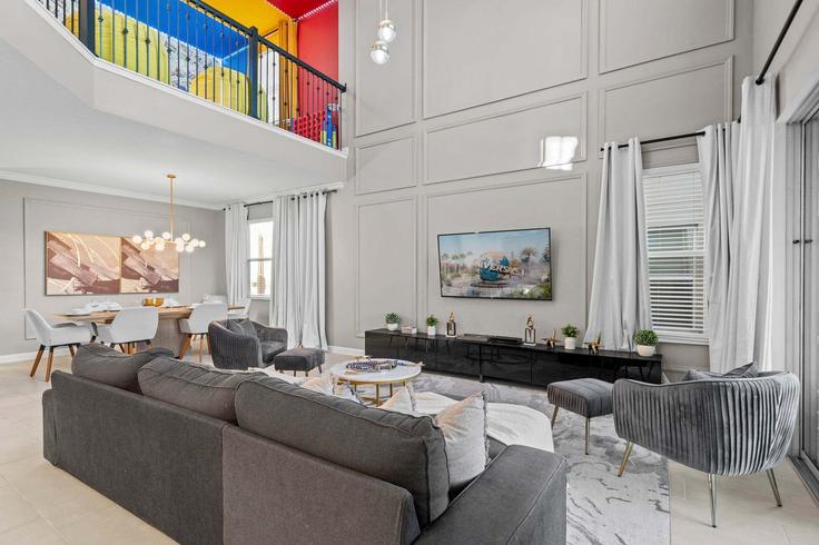 Elegante sala de estar con mobiliario moderno en un apartamento en Building Drop Shot Drive - stars-vacation-homes-dba - 1603813 en Four Corners, Four Corners Elegante sala de estar con mobiliario moderno en un apartamento en Building Drop Shot Drive - stars-vacation-homes-dba - 1603813 en Four Corners, Four Corners