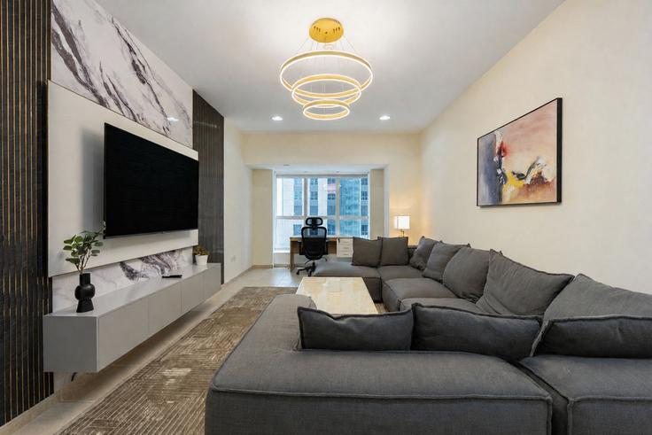 Dubai Dubai MarinaのBuilding Al Sharta Street - stay-group-2 - 1629366のアパートメントにある、モダンな家具を備えたエレガントなデザインのリビングルーム Dubai Dubai MarinaのBuilding Al Sharta Street - stay-group-2 - 1629366のアパートメントにある、モダンな家具を備えたエレガントなデザインのリビングルーム