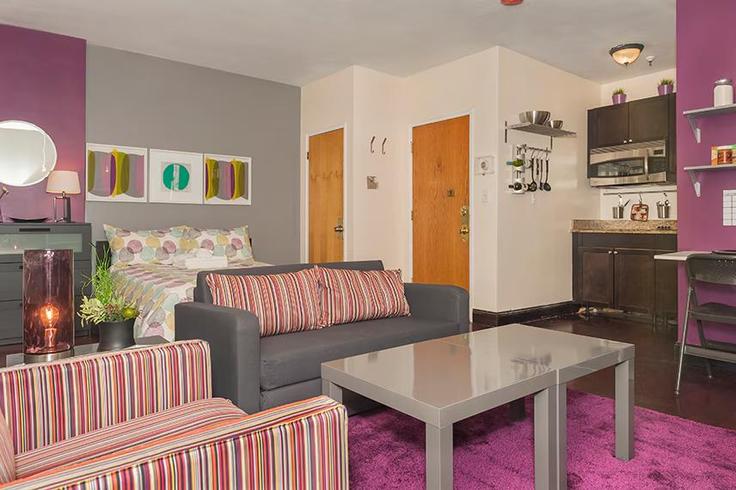 Sala de estar elegantemente projetada com móveis modernos em um apartamento no Building Stuart Street - stay-nue - 1366764 em Boston, Boston