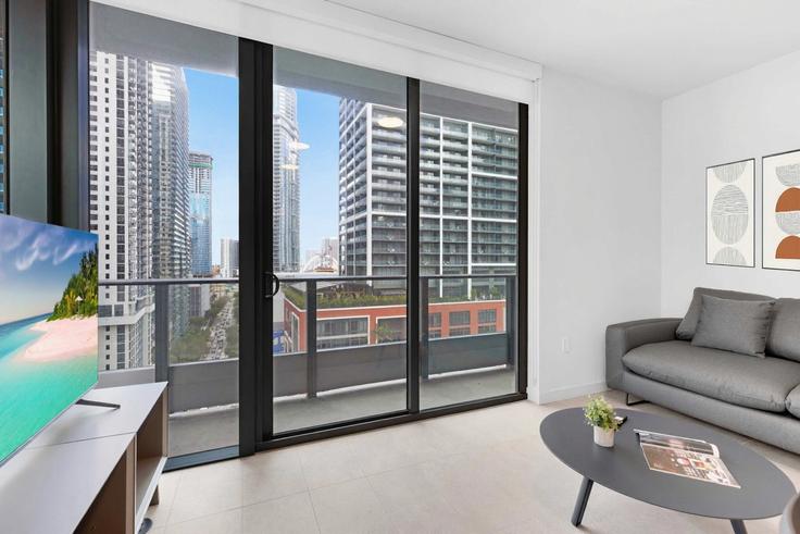 Elegantly designed living room with modern furnishings in an apartment at Building Northeast 1st Avenue - stay-sol - 1501422 in Miami, Miami Elegantly designed living room with modern furnishings in an apartment at Building Northeast 1st Avenue - stay-sol - 1501422 in Miami, Miami