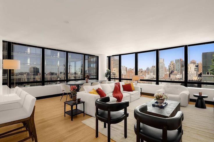 Elegante sala de estar con mobiliario moderno en un apartamento en Building York Avenue - stayhausguesty - 1321814 en Manhattan, New York Elegante sala de estar con mobiliario moderno en un apartamento en Building York Avenue - stayhausguesty - 1321814 en Manhattan, New York