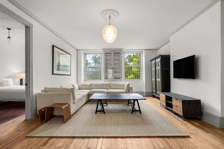 Elegantly designed living room with modern furnishings in an apartment at Building East Broadway - stayhausguesty - 1330811 in Manhattan, New York