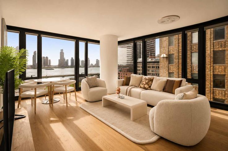 Elegantly designed living room with modern furnishings in an apartment at Building 1st Avenue - stayhausguesty - 1596999 in Manhattan, New York
