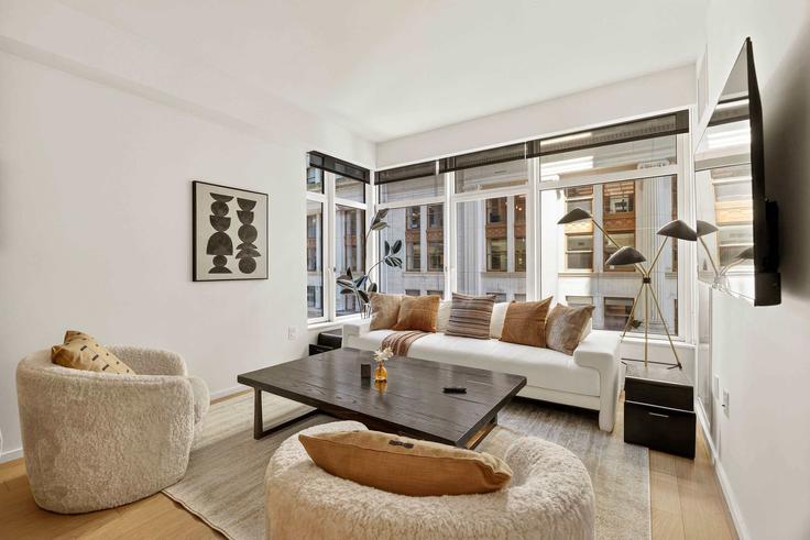 Manhattan, New York에 위치한 Building Dey Street - stayhausguesty - 1611029 유닛의 세련된 인테리어가 돋보이는 거실 Manhattan, New York에 위치한 Building Dey Street - stayhausguesty - 1611029 유닛의 세련된 인테리어가 돋보이는 거실