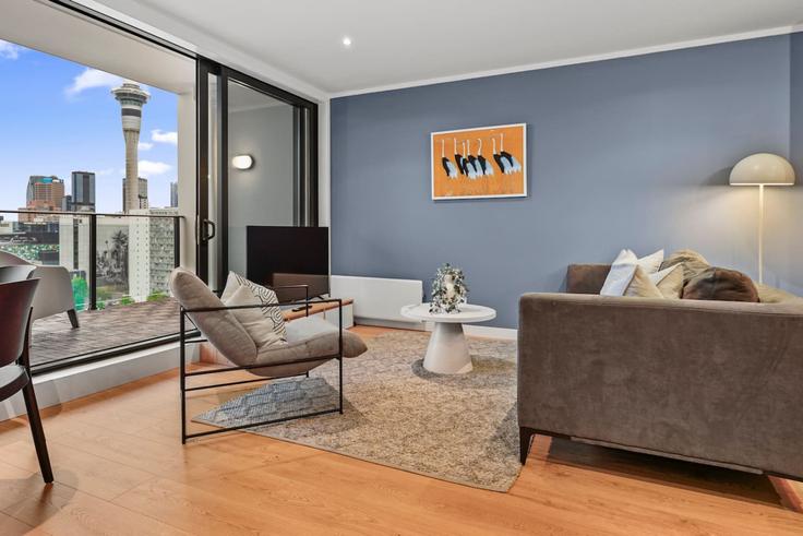Building Nelson Street - stayhub - 1336106 adresindeki bir dairede modern mobilyalarla zarif bir şekilde tasarlanmış oturma odası Auckland Central, Auckland Building Nelson Street - stayhub - 1336106 adresindeki bir dairede modern mobilyalarla zarif bir şekilde tasarlanmış oturma odası Auckland Central, Auckland