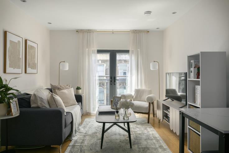 Elegante sala de estar con mobiliario moderno en un apartamento en Building Graham Road - staynorth - 1587751 en London Borough of Hackney, London Elegante sala de estar con mobiliario moderno en un apartamento en Building Graham Road - staynorth - 1587751 en London Borough of Hackney, London