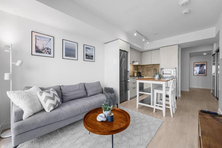 Elegantly designed living room with modern furnishings in an apartment at Building Yonge Street - stayrentx - 1388893 in Old Toronto, Toronto