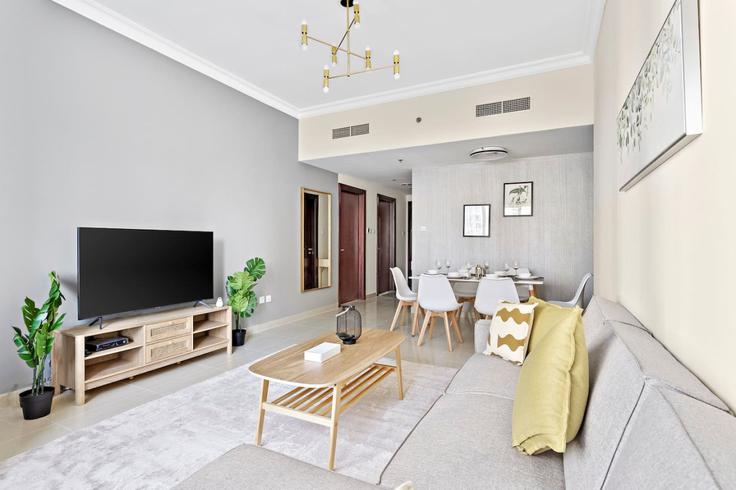 Dubai JLTのBuilding Cluster V - stonetree-vacation-homes - 1316965 - DXBのアパートメントにある、モダンな家具を備えたエレガントなデザインのリビングルーム