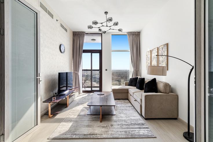 Salle de séjour élégante avec mobilier moderne dans un appartement à Building Al Asayel Street - stonetree-vacation-homes - 1373017 à Jebel Ali Village, Dubai Salle de séjour élégante avec mobilier moderne dans un appartement à Building Al Asayel Street - stonetree-vacation-homes - 1373017 à Jebel Ali Village, Dubai