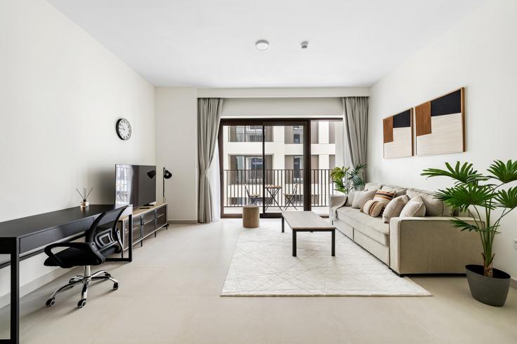 Dubai Al Kheeran FirstのBuilding Tariaq Bedon Esm - stonetree-vacation-homes - 1378953のアパートメントにある、モダンな家具を備えたエレガントなデザインのリビングルーム