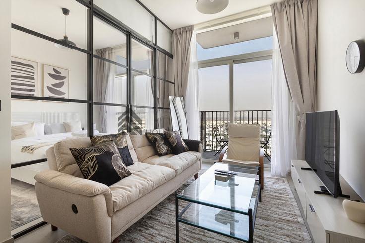 Salle de séjour élégante avec mobilier moderne dans un appartement à Building Collective Tower 1 - stonetree-vacation-homes - 1317262 à Dubai Hills Estate, Dubai Salle de séjour élégante avec mobilier moderne dans un appartement à Building Collective Tower 1 - stonetree-vacation-homes - 1317262 à Dubai Hills Estate, Dubai