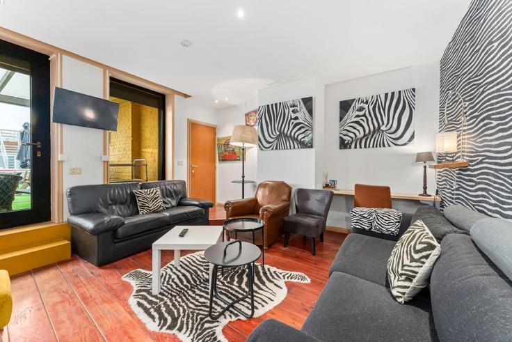 Sala de estar elegantemente projetada com móveis modernos em um apartamento no Building Watouplein - studio-rippple - 1587040 em Poperinge, Poperinge Sala de estar elegantemente projetada com móveis modernos em um apartamento no Building Watouplein - studio-rippple - 1587040 em Poperinge, Poperinge
