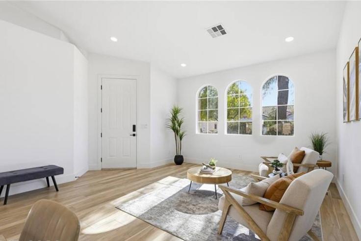 Elegantly designed living room with modern furnishings in an apartment at Building 4176 Demoline Circle - suite-spot-lv - 1688671 in Enterprise, Enterprise