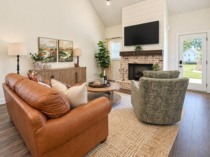 Elegantly designed living room with modern furnishings in an apartment at Building Old Alabama Road Southeast - suite-stays-atlanta - 1647014 in Emerson, Emerson