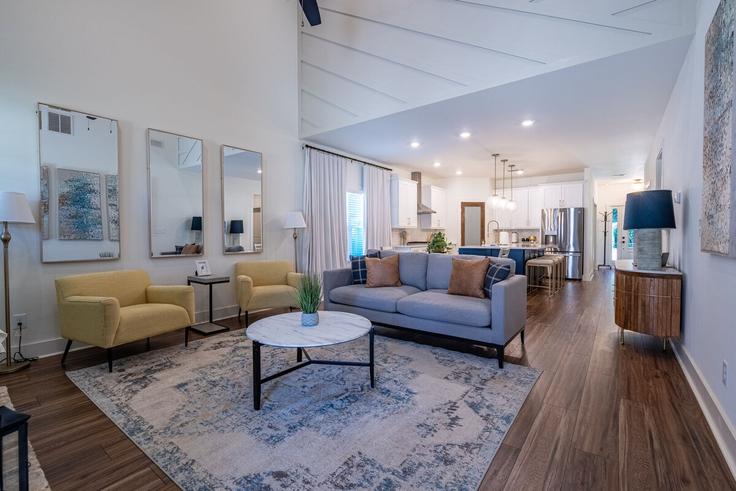 Elegantly designed living room with modern furnishings in an apartment at Building Puckett Road Southeast - suite-stays-atlanta - 1694937 in Emerson, Emerson
