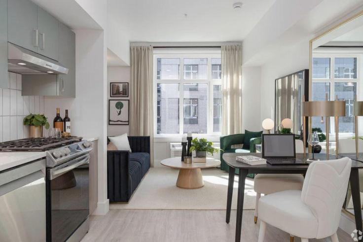 Elegante sala de estar con mobiliario moderno en un apartamento en Building Northwest Savier Street - suiteamerica - 1267701 - PDX en Portland, Portland Elegante sala de estar con mobiliario moderno en un apartamento en Building Northwest Savier Street - suiteamerica - 1267701 - PDX en Portland, Portland