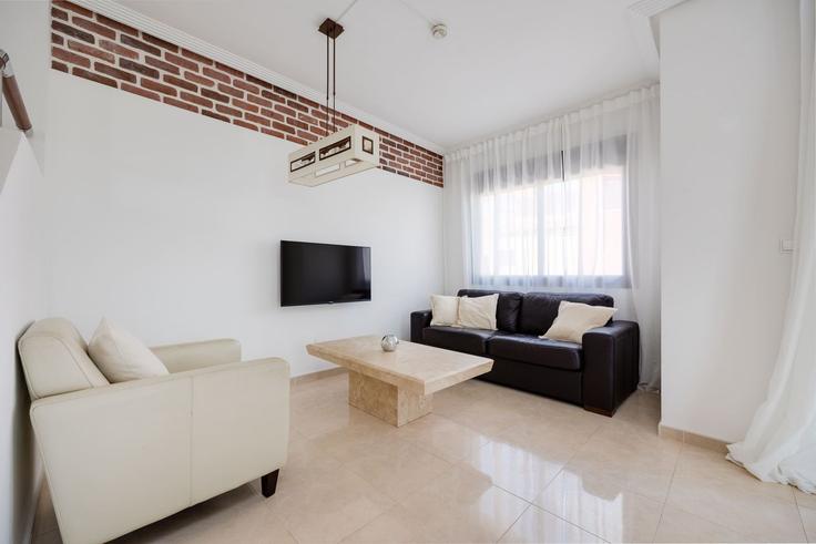 Elegantly designed living room with modern furnishings in an apartment at Building Calle Cabo Santa Maria - sunny-homes-rentals-sl - 1351701 in Dehesa de Campoamor, Dehesa de Campoamor
