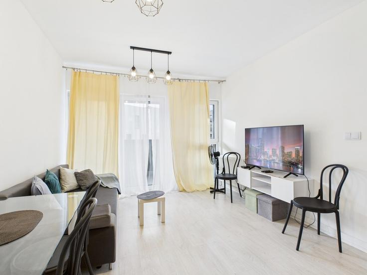 Salle de séjour élégante avec mobilier moderne dans un appartement à Building Augustówka - superapart - 1298677 - POL à Warsaw, Warsaw Salle de séjour élégante avec mobilier moderne dans un appartement à Building Augustówka - superapart - 1298677 - POL à Warsaw, Warsaw