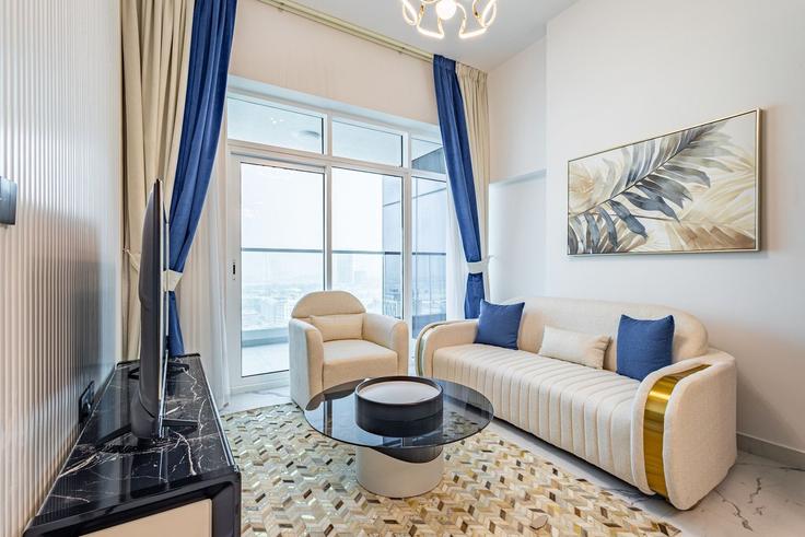 Salle de séjour élégante avec mobilier moderne dans un appartement à Building Arjan - superhost-vacation-homes - 1497029 à Al Barsha South Third, Dubai