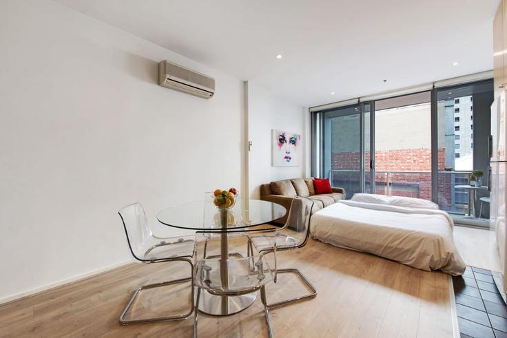 Elegante sala de estar con mobiliario moderno en un apartamento en Building York Street - swainson - 1315077 - AUS en Adelaide, Adelaide