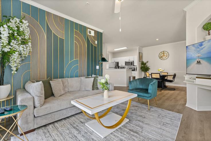 Sala de estar elegantemente projetada com móveis modernos em um apartamento no Building Portofino Drive - sweet-home-furnished-rentals-llc - 1511053 em Tampa, Tampa Sala de estar elegantemente projetada com móveis modernos em um apartamento no Building Portofino Drive - sweet-home-furnished-rentals-llc - 1511053 em Tampa, Tampa