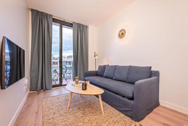 Barcelona EixampleのBuilding Carrer de Girona - sweett - 1053459 - BCNのアパートメントにある、モダンな家具を備えたエレガントなデザインのリビングルーム