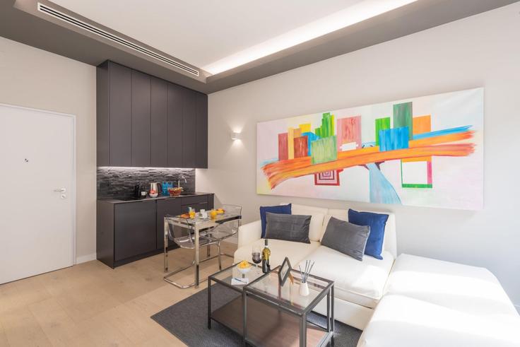 Elegant gestaltetes Wohnzimmer mit moderner Einrichtung in einer Wohnung im Building Via Cappellari - sweett - 1053577 - ITA in Milan, Milan Elegant gestaltetes Wohnzimmer mit moderner Einrichtung in einer Wohnung im Building Via Cappellari - sweett - 1053577 - ITA in Milan, Milan