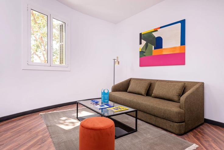 Elegantly designed living room with modern furnishings in an apartment at Building Carrer d'Aragó - sweett - 1053408 - BCN in Eixample, Barcelona