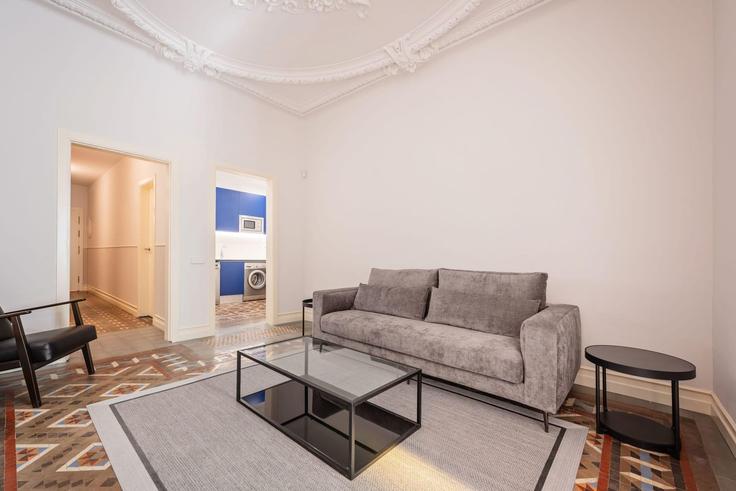 Elegant gestaltetes Wohnzimmer mit moderner Einrichtung in einer Wohnung im Building Gran Via de les Corts Catalanes - sweett - 1053753 - BCN in Eixample, Barcelona