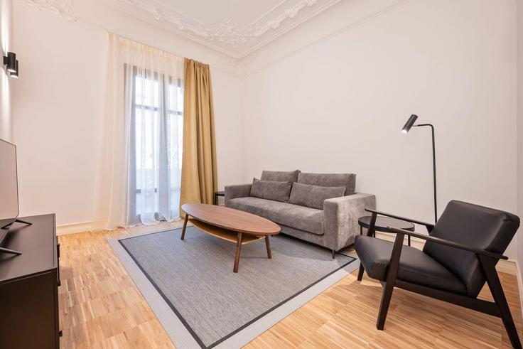 Barcelona EixampleのBuilding Gran Via de les Corts Catalanes - sweett - 1053741 - BCNのアパートメントにある、モダンな家具を備えたエレガントなデザインのリビングルーム