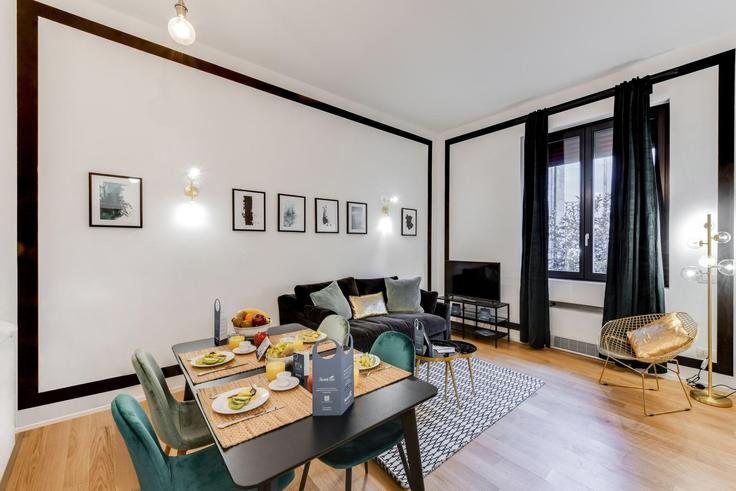 Salle de séjour élégante avec mobilier moderne dans un appartement à Building Via Flavio Baracchini - sweett - 1053671 - ITA à Milan, Milan Salle de séjour élégante avec mobilier moderne dans un appartement à Building Via Flavio Baracchini - sweett - 1053671 - ITA à Milan, Milan