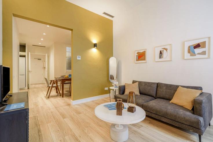 Sala de estar elegantemente projetada com móveis modernos em um apartamento no Building Carrer de Sepúlveda - sweett - 1053597 - BCN em Eixample, Barcelona Sala de estar elegantemente projetada com móveis modernos em um apartamento no Building Carrer de Sepúlveda - sweett - 1053597 - BCN em Eixample, Barcelona