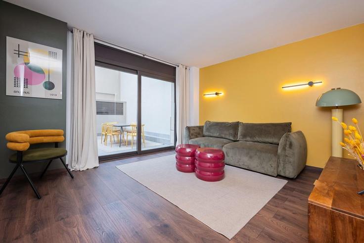 Sala de estar elegantemente projetada com móveis modernos em um apartamento no Building Carrer de Bailèn - sweett - 1053449 - BCN em Eixample, Barcelona Sala de estar elegantemente projetada com móveis modernos em um apartamento no Building Carrer de Bailèn - sweett - 1053449 - BCN em Eixample, Barcelona