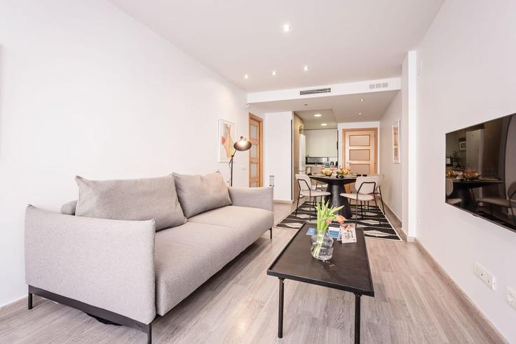 Sala de estar elegantemente projetada com móveis modernos em um apartamento no Building Carrer de València - sweett - 1054008 - BCN em Eixample, Barcelona