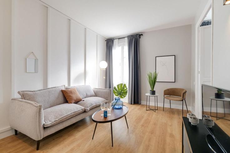 Sala de estar elegantemente projetada com móveis modernos em um apartamento no Building Carrer de Sepúlveda - sweett - 1053314 - BCN em Eixample, Barcelona Sala de estar elegantemente projetada com móveis modernos em um apartamento no Building Carrer de Sepúlveda - sweett - 1053314 - BCN em Eixample, Barcelona