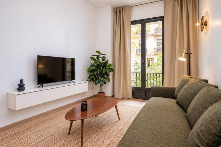 Salle de séjour élégante avec mobilier moderne dans un appartement à Building Carrer de Girona - sweett - 1053460 - BCN à Eixample, Barcelona Salle de séjour élégante avec mobilier moderne dans un appartement à Building Carrer de Girona - sweett - 1053460 - BCN à Eixample, Barcelona