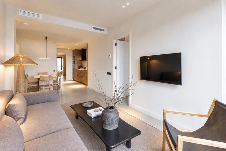 Sala de estar elegantemente projetada com móveis modernos em um apartamento no Building Avinguda Diagonal - sweett - 1321190 em Eixample, Barcelona Sala de estar elegantemente projetada com móveis modernos em um apartamento no Building Avinguda Diagonal - sweett - 1321190 em Eixample, Barcelona