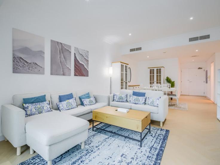 Elegantly designed living room with modern furnishings in an apartment at Building Alkhayay Street - t-r-p-s-vacation-homes-rental-co-llc - 1297367 in Dubai Marina, Dubai