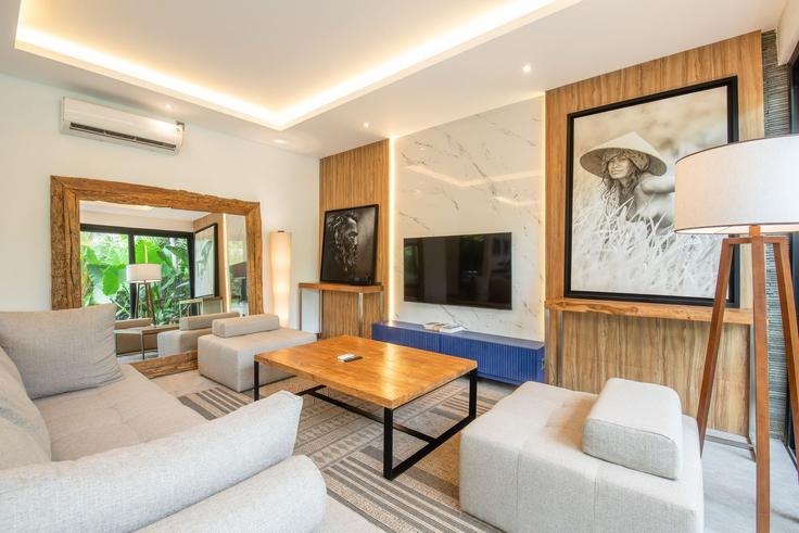 Salle de séjour élégante avec mobilier moderne dans un appartement à Building Jalan Mertanadi - tertata-jelas-mgmt - 1366535 à Kuta Utara, Badung Regency Salle de séjour élégante avec mobilier moderne dans un appartement à Building Jalan Mertanadi - tertata-jelas-mgmt - 1366535 à Kuta Utara, Badung Regency