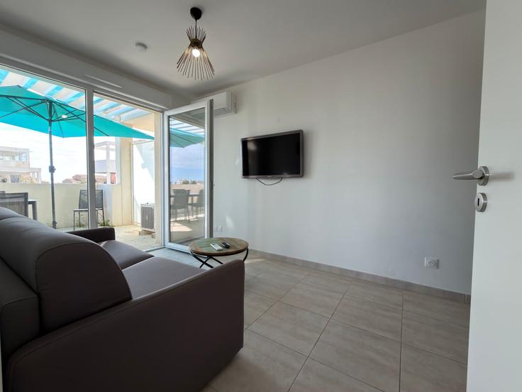 Sérignan, Sérignan에 위치한 Building Chemin de l'Oranger Prolongé - the-best-partner-valrasloc - 1284509 - PAR 유닛의 세련된 인테리어가 돋보이는 거실