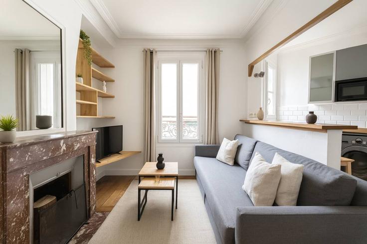 Sala de estar elegantemente projetada com móveis modernos em um apartamento no Building Rue Custine - the-flex-paris - 1388316 em 18th arrondissement, Paris Sala de estar elegantemente projetada com móveis modernos em um apartamento no Building Rue Custine - the-flex-paris - 1388316 em 18th arrondissement, Paris