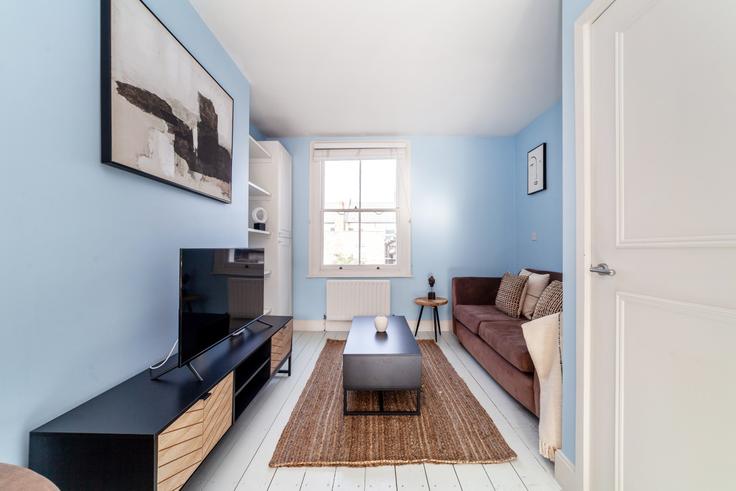 Sala de estar elegantemente projetada com móveis modernos em um apartamento no Building Hormead Road - the-flex - 1254252 - LON em City of Westminster, London