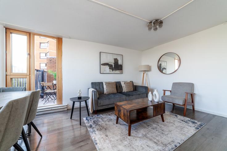 Elegantly designed living room with modern furnishings in an apartment at Building Blantyre Street - the-flex - 1502745 in Royal Borough of Kensington and Chelsea, London