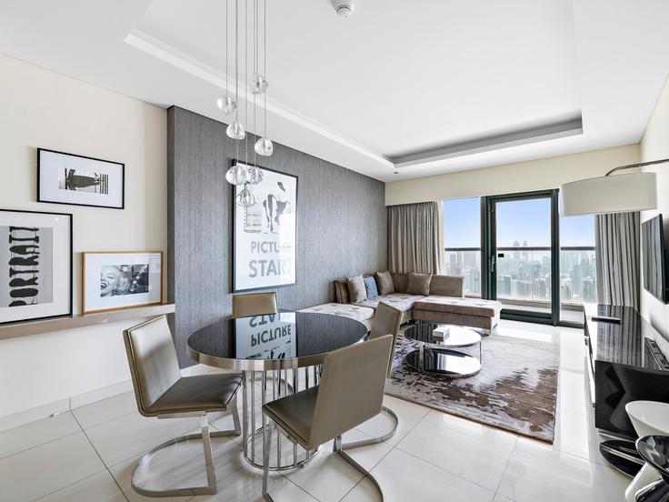 Elegantly designed living room with modern furnishings in an apartment at Building Al Mustaqbal Street - the-prive-hospitality-vacation-homes - 1258203 - DXB in Business Bay, Dubai