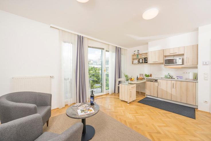 Elegant gestaltetes Wohnzimmer mit moderner Einrichtung in einer Wohnung im Building Doktor-Josef-Resch-Platz - the-ranks-gmbh - 1587023 in Vienna, Vienna Elegant gestaltetes Wohnzimmer mit moderner Einrichtung in einer Wohnung im Building Doktor-Josef-Resch-Platz - the-ranks-gmbh - 1587023 in Vienna, Vienna