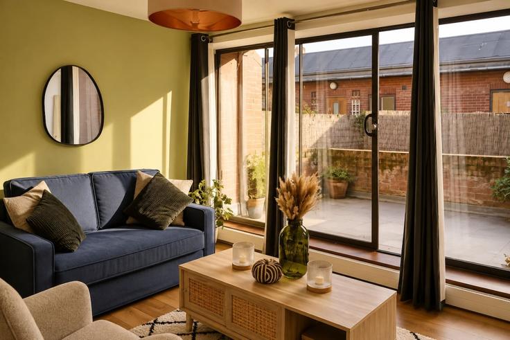 Elegantly designed living room with modern furnishings in an apartment at Building Werrington Street - the-stress-free-group - 1648159 in London Borough of Camden, London