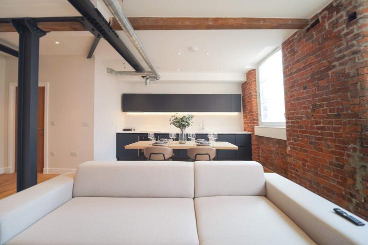 Sala de estar elegantemente projetada com móveis modernos em um apartamento no Building Addington Street - theheim - 1499246 em Manchester, Manchester